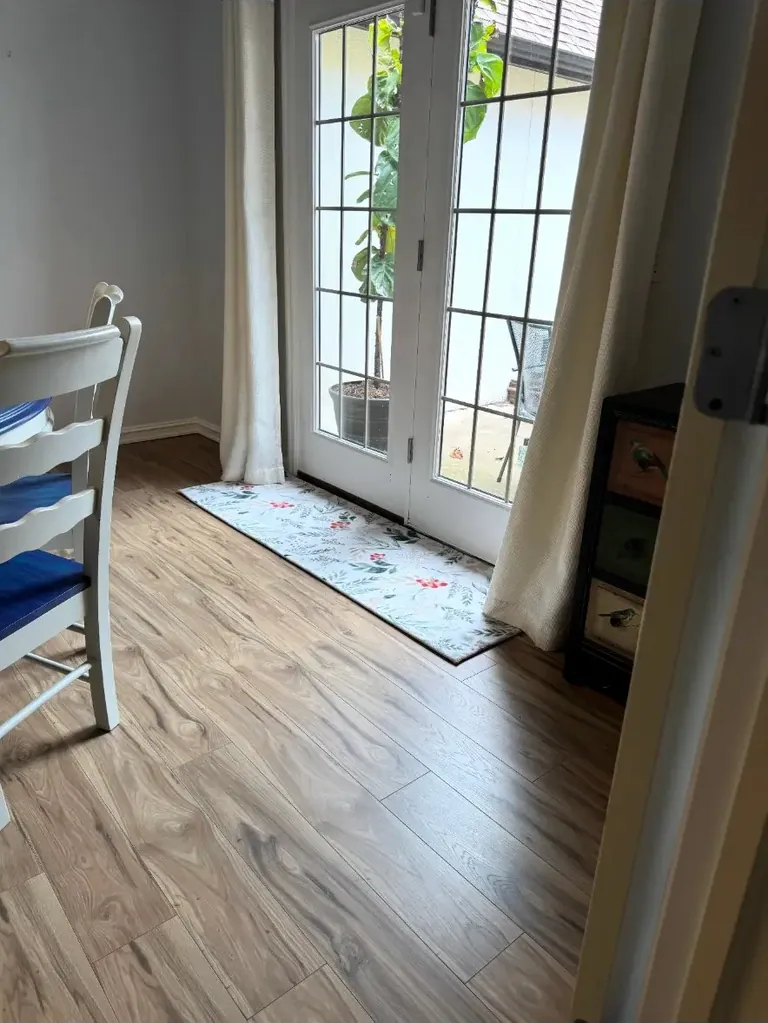 Completed laminate flooring work by Blue Spruce Handyman Services